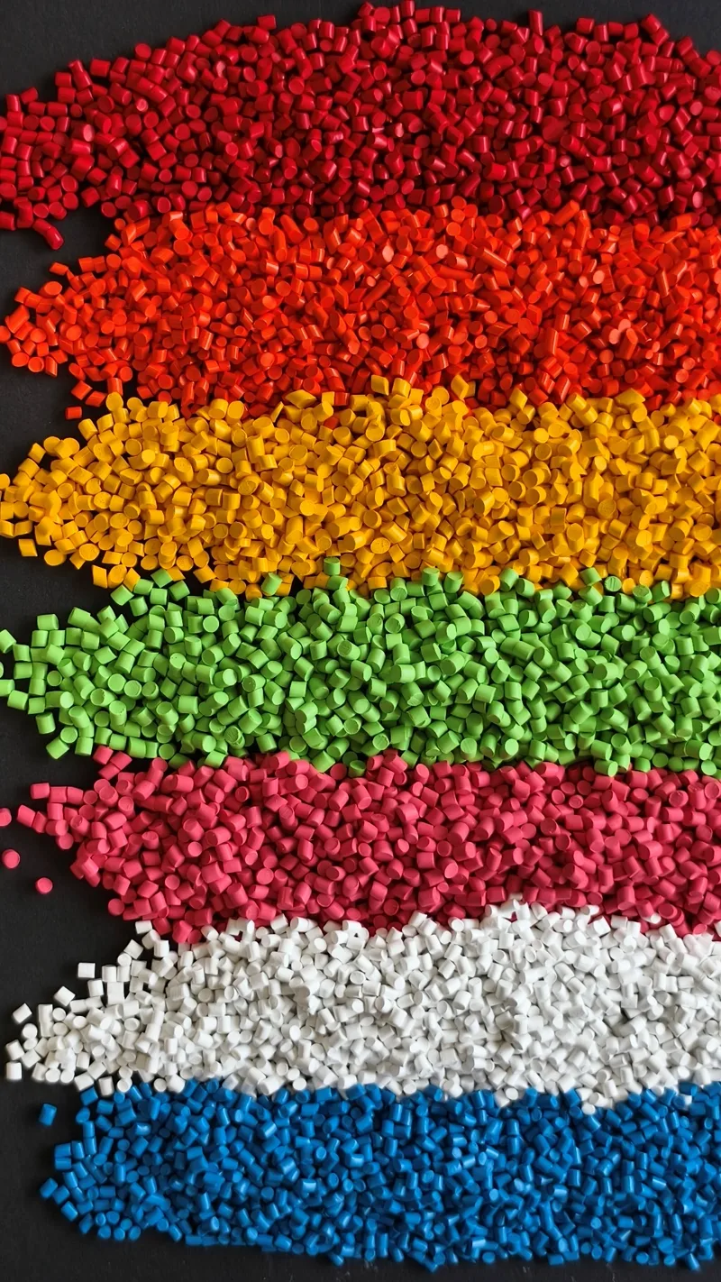Polymer resin pellets in assorted colors