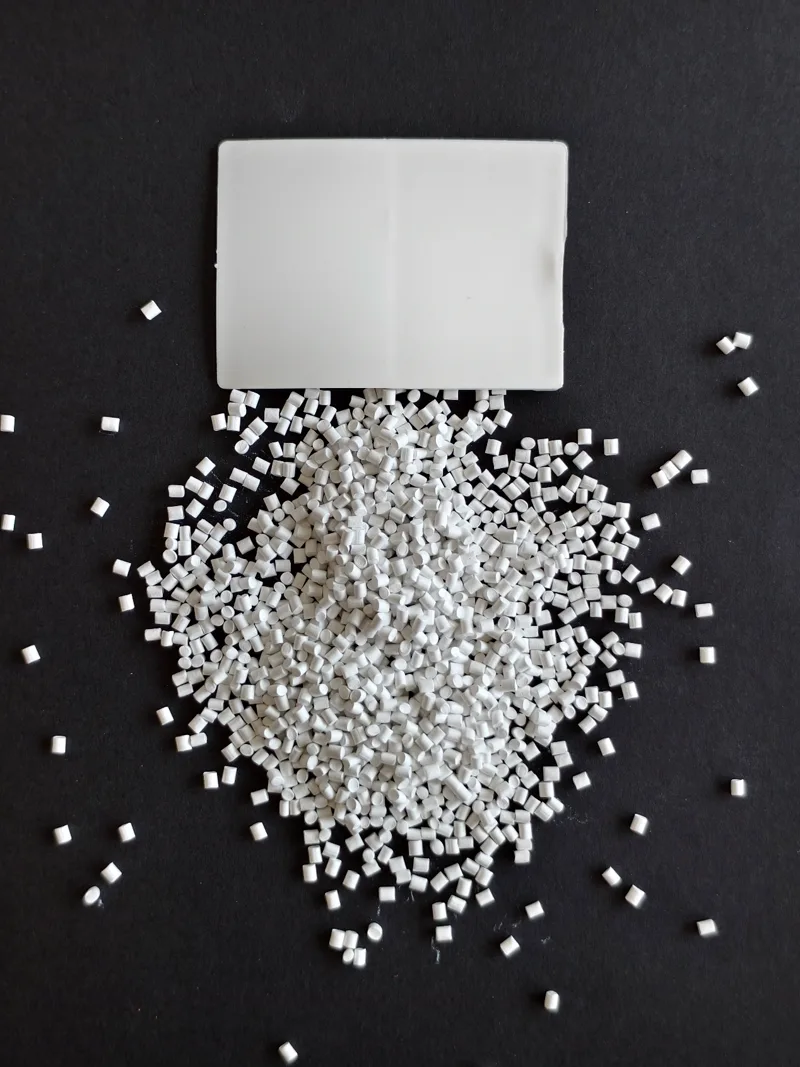 White molded resin plaque with matching pellets
