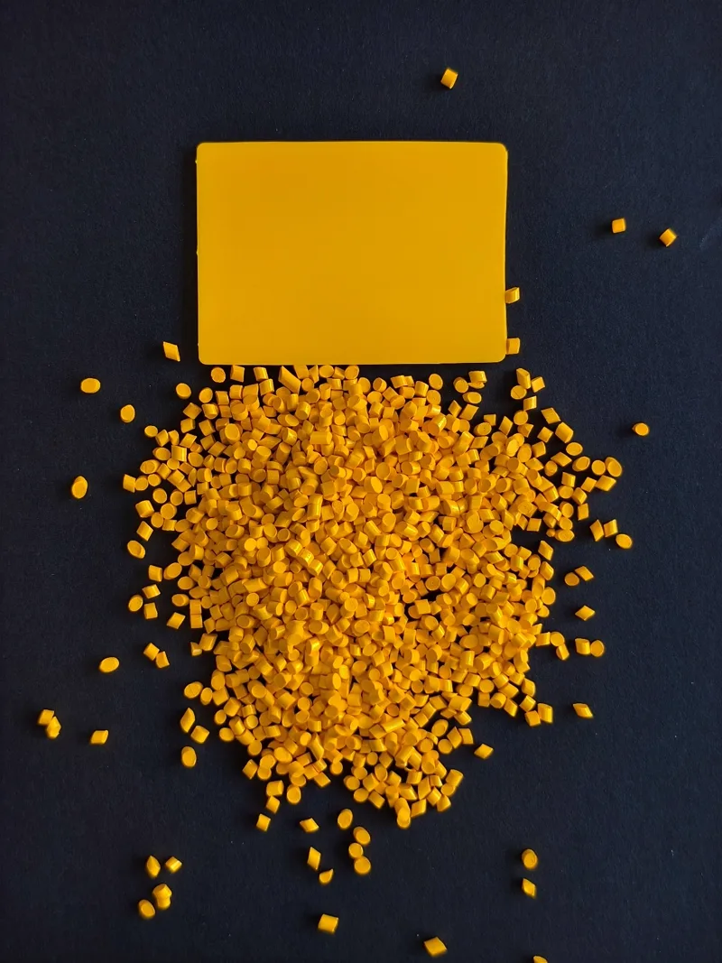 Yellow molded resin plaque with matching pellets
